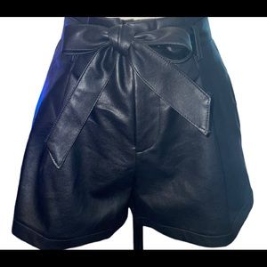 Leather like NWOT New condition, never worn.